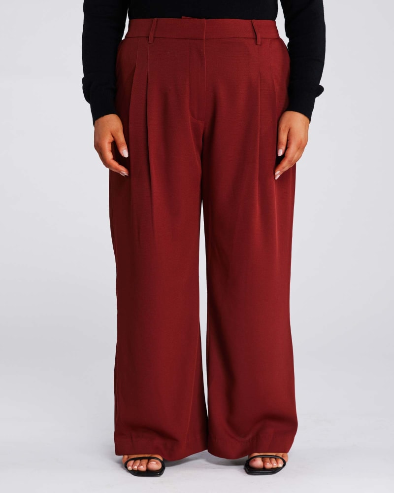 Front of a model wearing a size 24W Woodland Pant in Ginger by Estelle. | dia_product_style_image_id:315666